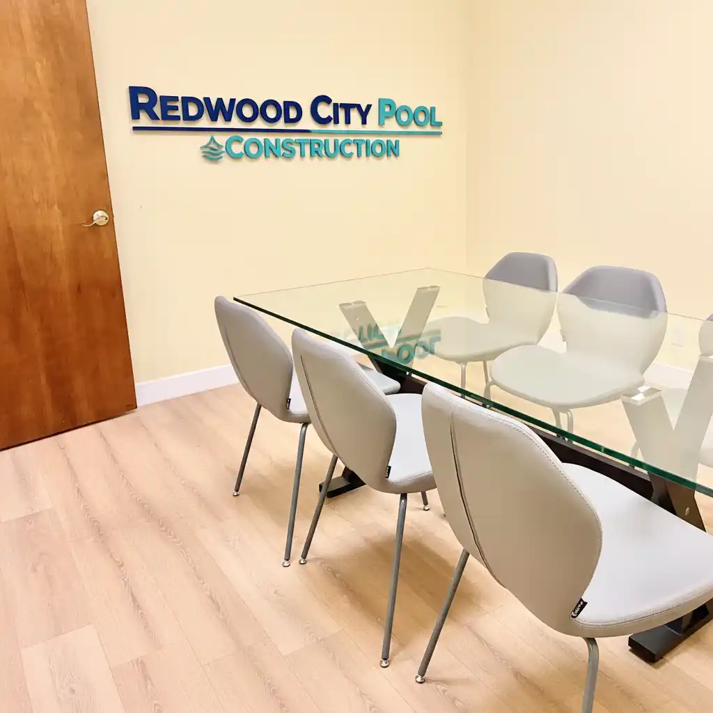 Redwood City Pool Construction office interior with company logo